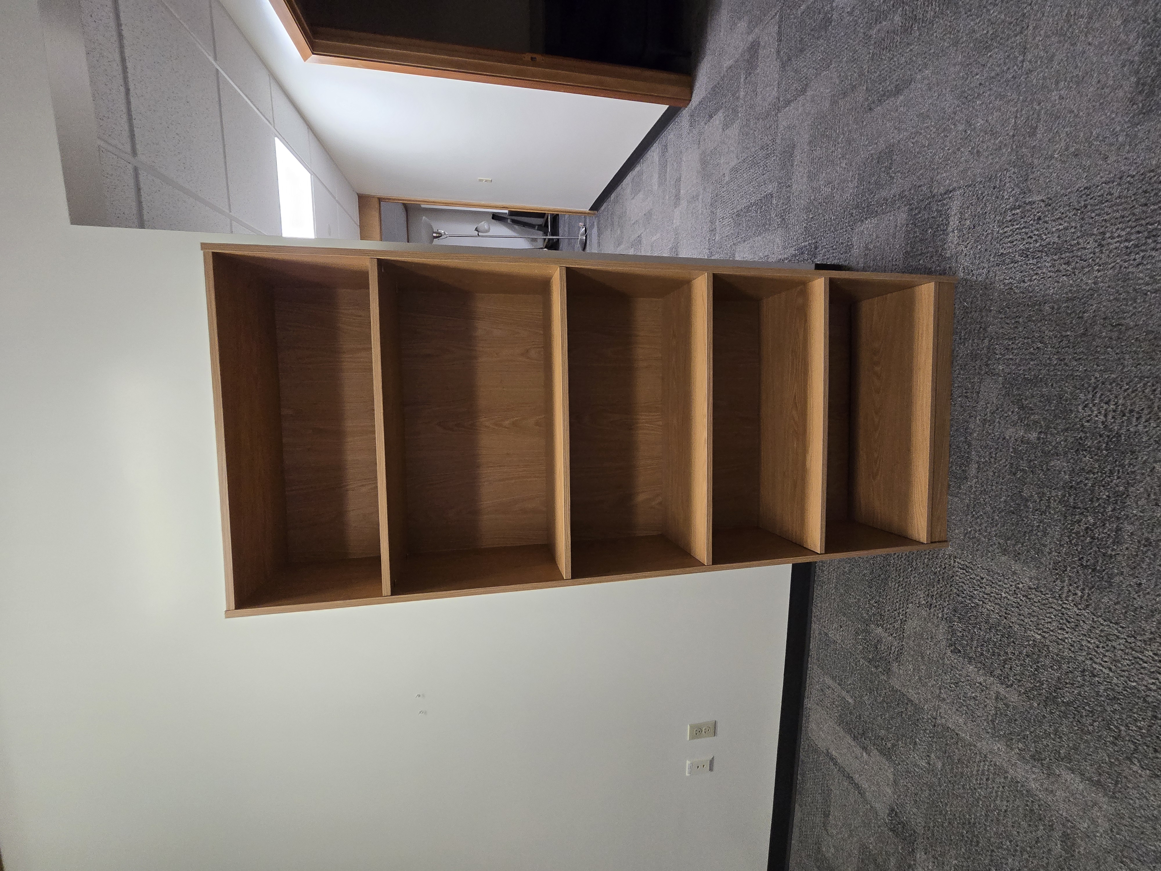 Particle board bookcase.