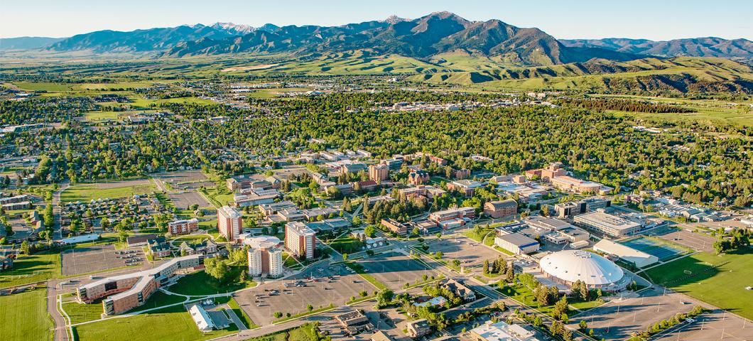 Summertime view of the Gallatin Valley with the MSU campus in the foreground, and the Bridgers in the distance.