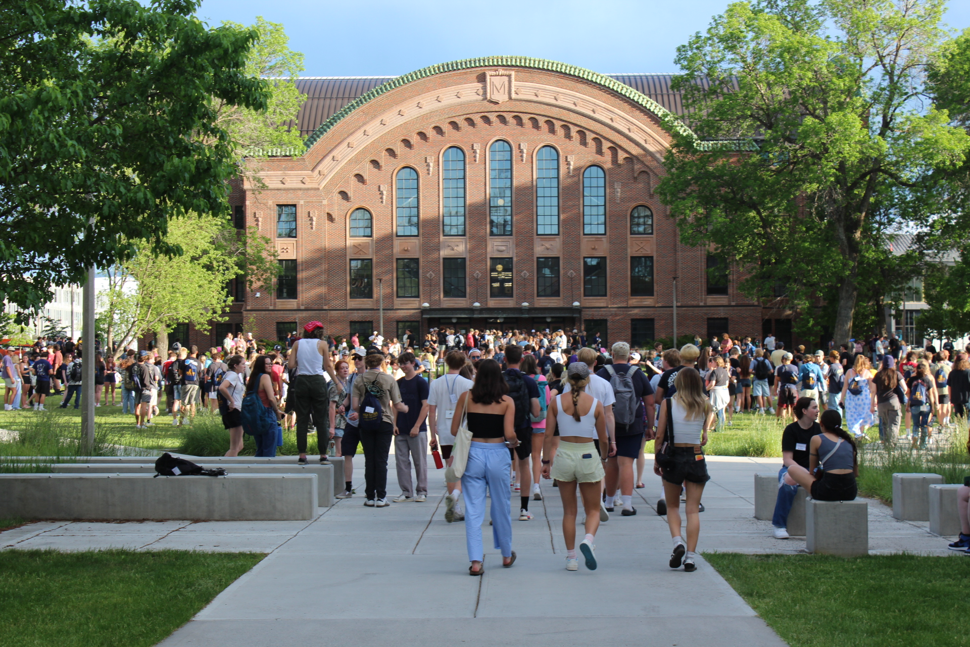 Students congregate on the Romney Oval. 