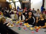 Students eating at the party