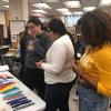 Students lining up for beads at Bead and Feed