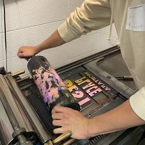 A student explores a unique printing texture technique. 