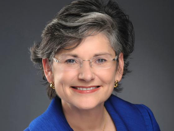 Portrait of Waded Cruzado in a studio, wearing a blue outfit.  | Kelly Gorham/MSU