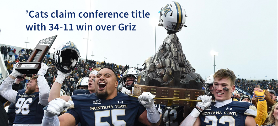 Montana State University football players hoist the Brawl of the Wild trophy after defeating UM 34-11.  | MSU