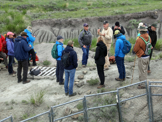 A group of people standing at a paleontological site. | Submitted photo.