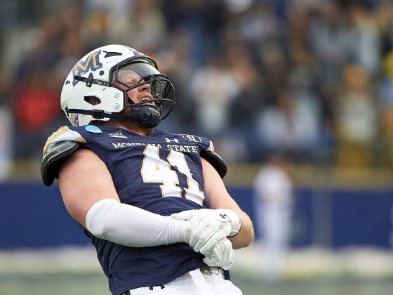 Brody Grebe celebrating during a football game | MSU photo by Kelly Gorham