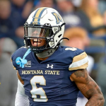 "Montana State University football player wearing a blue and gold uniform celebrates on the field during a game, with the text overlay: 'GO 'CATS! MSU will host Idaho for FCS playoffs. Game at 7 p.m. Friday.'"