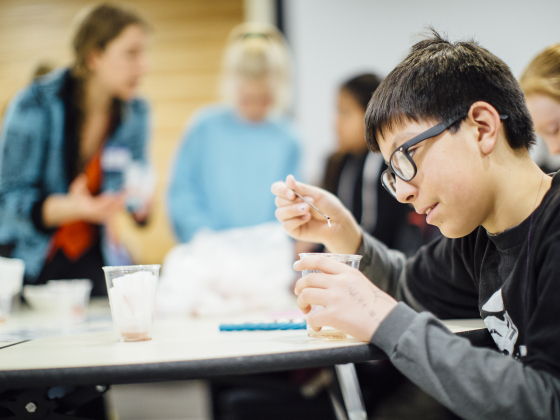 A student carries out a science experiment | MSU Photo by Adrian Sanchez-Gonzalez