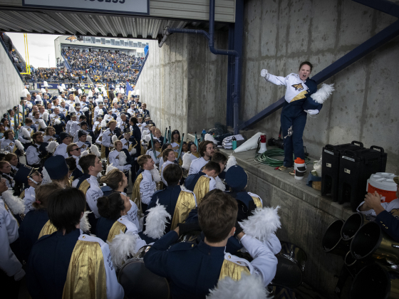 marching band rally in stadium tunnel | Colter Peterson