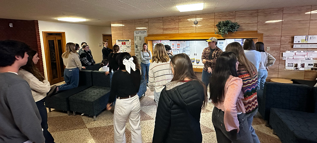 Students gather in Reid Hall for the Native Nations of Montana Gallery walk. 