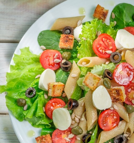 A bowl of chicken club salad.