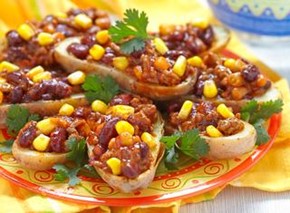 An image of Santa Fe potatoes on a yellow and orange plate.