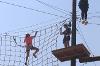 MSU Hilleman Scholar crosses the high ropes course at Rockhaven.