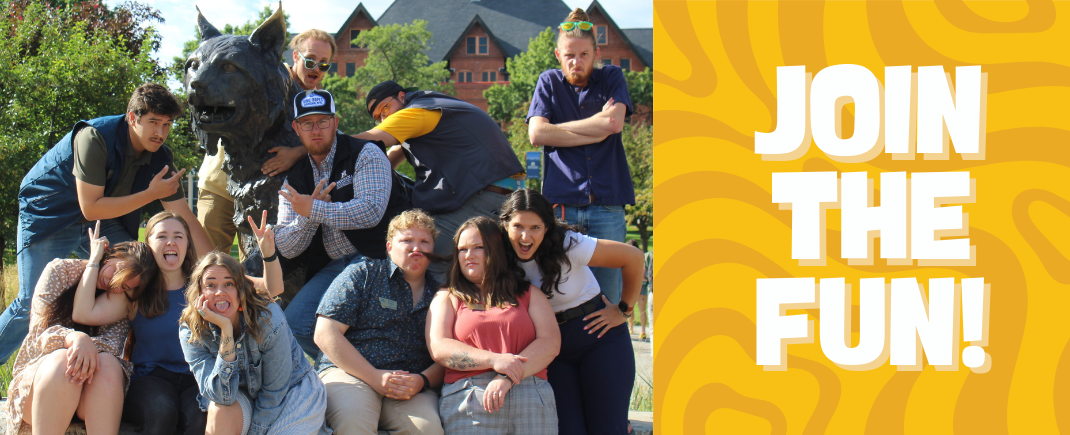 Picture of 11 community directors outside of Montana Hall and the Spirit statue with rightside banner that states "Join the fun!"