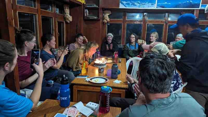 Mary blows out the candles on her cake