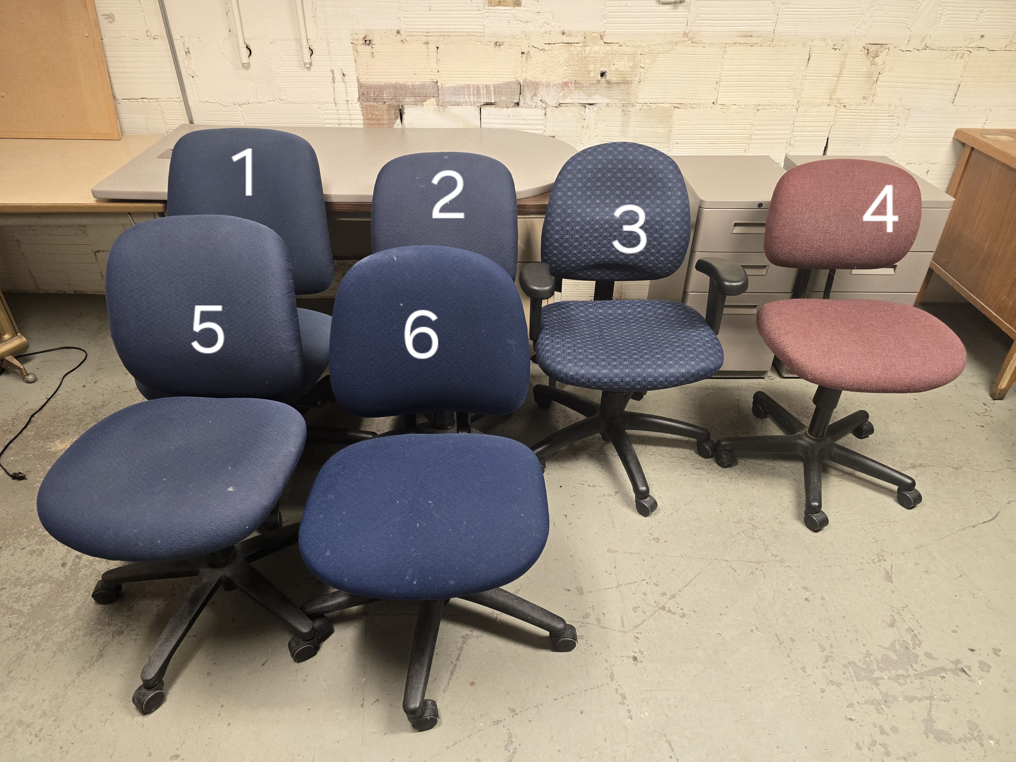 Assorted rolling office chairs