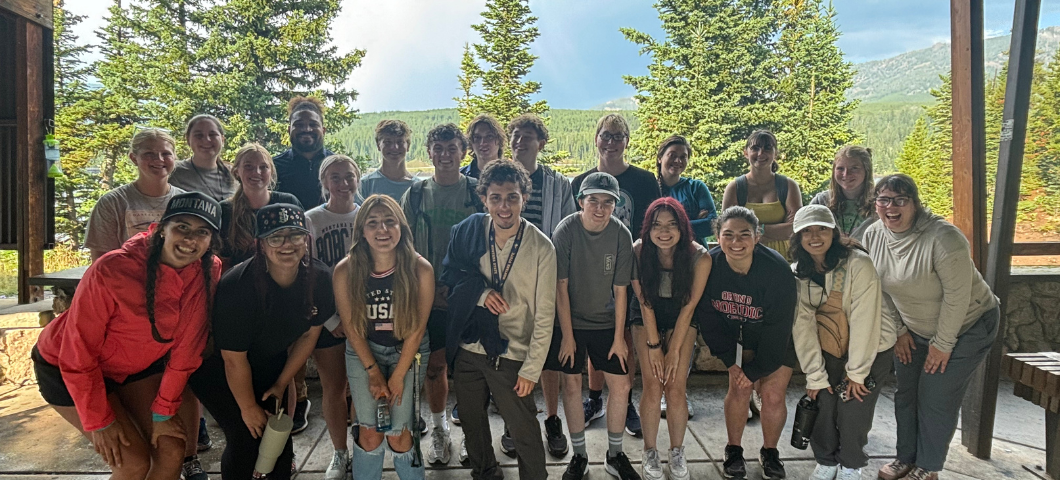 A group of TRIO Scholars posing for a group photo under a pavilion