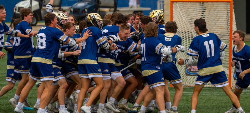 MSU's men's club lacrosse team celebrates after winning a national title in 2024. Image courtesy of Todd Kinney.